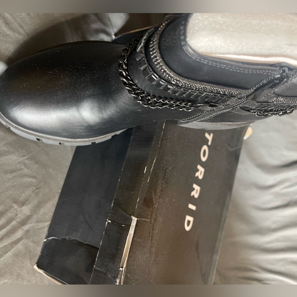 Brand new never worn Torrid Chelsea style boots with chain embellishments